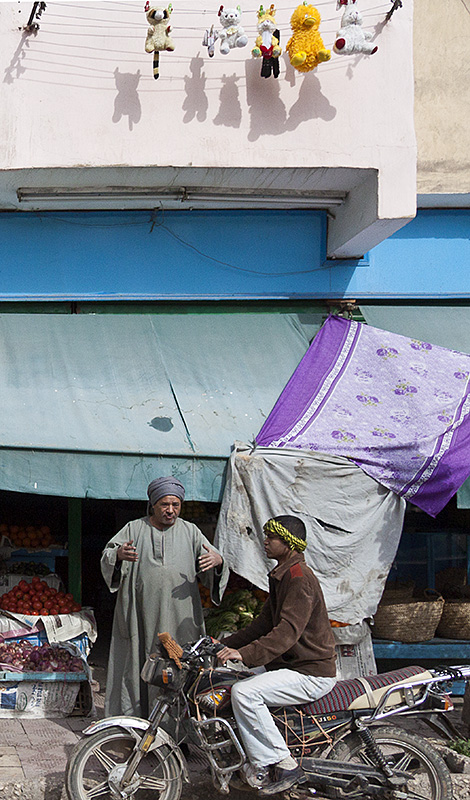 Luxor :: Shopkeeper and Motorbike